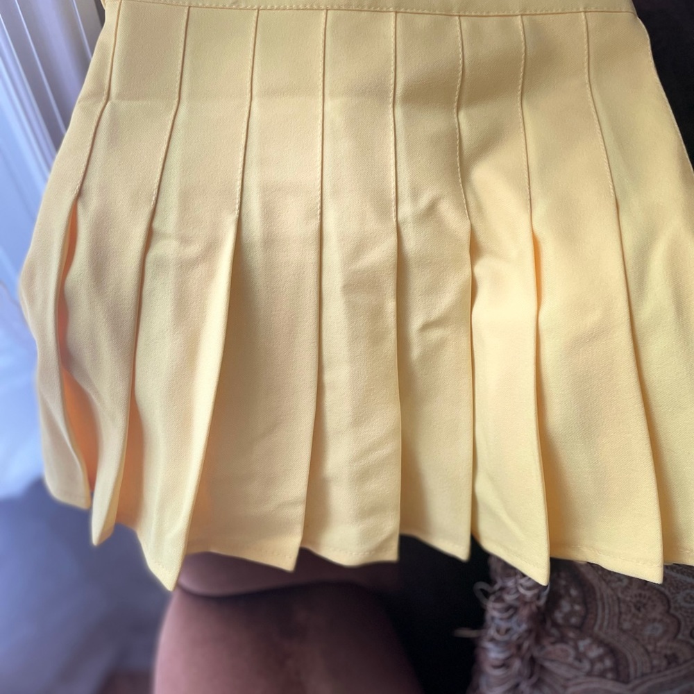 Banana yellow tennis skirt size small .
